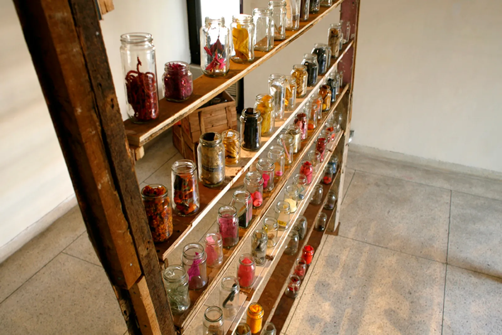 Odds and Ends, 2012 — the shelf unit against the wall, jars by the hundred