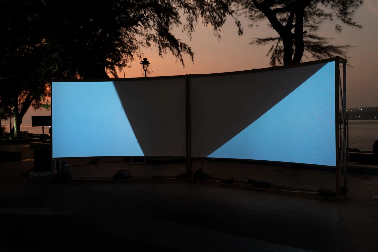In Praise of Shadows, 2022 — two-channel video projection, installation view