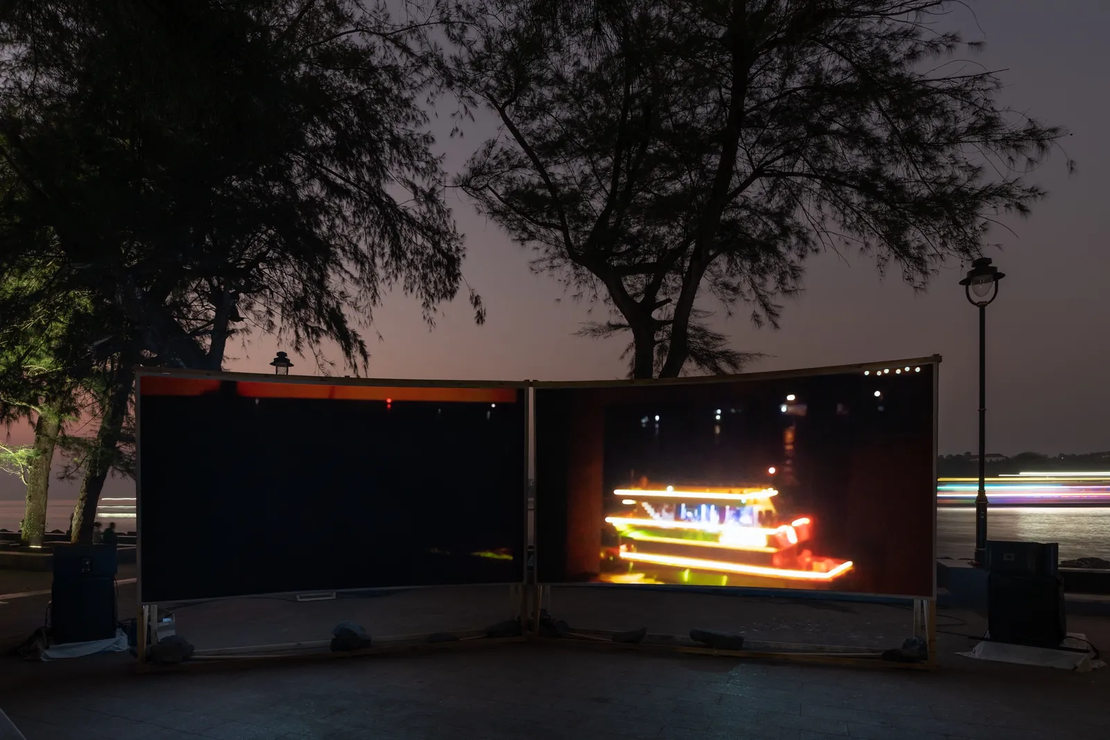 In Praise of Shadows, 2022 — two-channel video projection, installation view